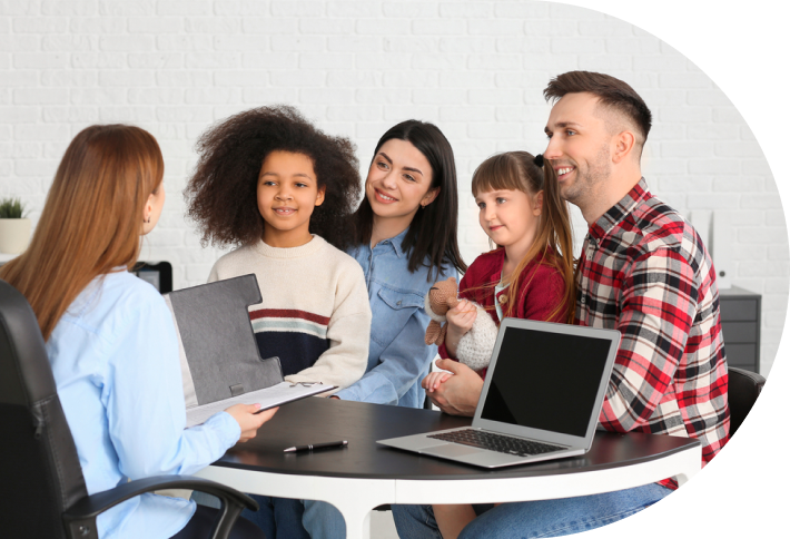 Family talking with social worker